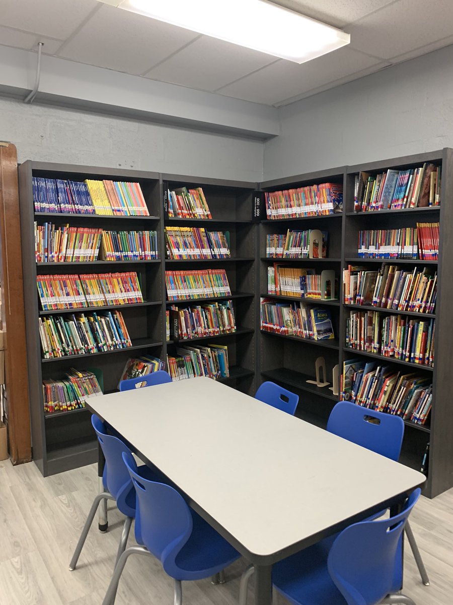 DBemkeWWMS's tweet photo. Worked hard this past week getting @16Clifton ready to open for students in a few weeks. The shelves are full just waiting for the students to check out all the new books !!📚📚@CliftonSchools @VKropinack @CliftonSupt https://t.co/Q0nuTiJ5gz