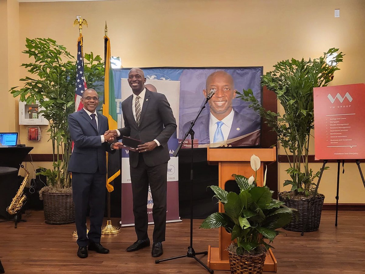 myvmgroup's tweet photo. President and CEO of VM Group Courtney Campbell receiving the keys to the City of Miramar from Mayor Wayne Messam for VM Group’s outstanding work in the Diaspora, making reference to our legacy and longevity of just about 144 years of operation. https://t.co/0wCafNleFq