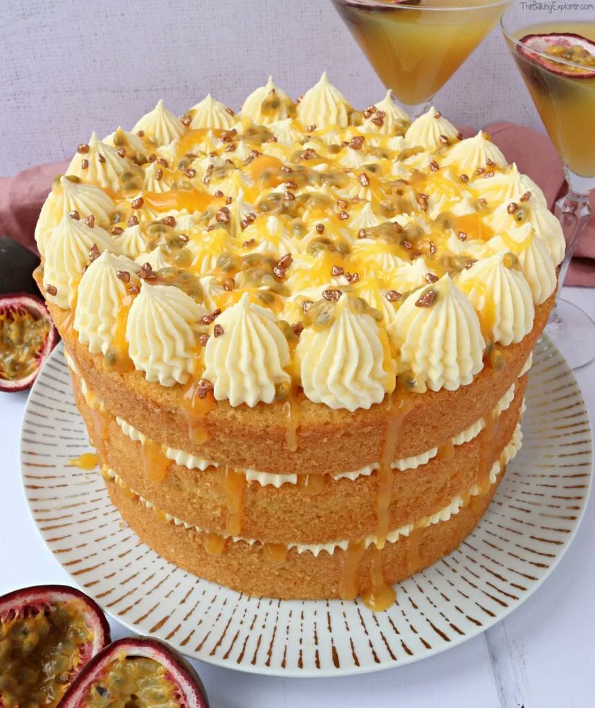 BakingExplorer's tweet photo. This Passion Fruit Martini Cake is a delicious cake inspired by the well known cocktail! It has three layers of lime and vanilla sponge, prosecco buttercream and lots of passion fruit curd! Get the recipe here: https://t.co/pdybuxoZ4R https://t.co/G7mUZpToRc
