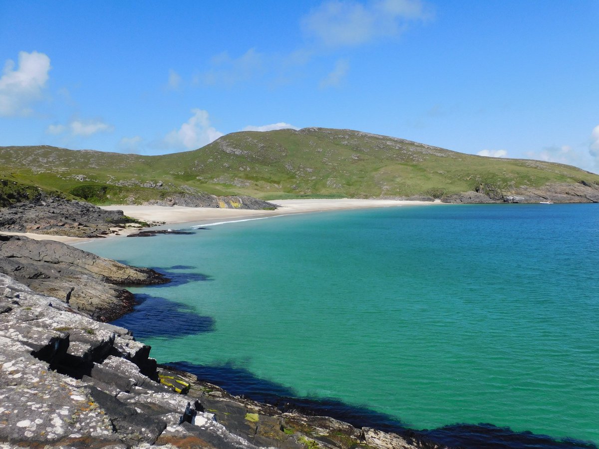Mingulay Beach, now uninhabited, the village was situated just to the west of the beach. No pier, clamber from a boat on to the rocks on which this photo was taken.