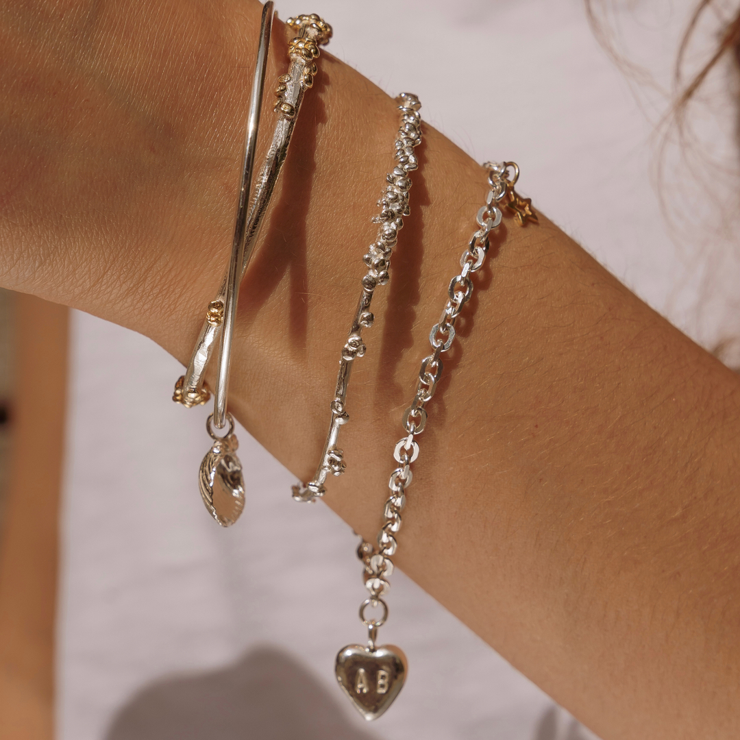As part of our ARCHIVE SALE 
We have a couple of these gorgeous personalised Heart bracelets left in stock.

So if you’re looking for a sentimental milestone birthday or a anniversary celebration gift- our beautiful handcrafted bracelet with a personalised heart will show how m