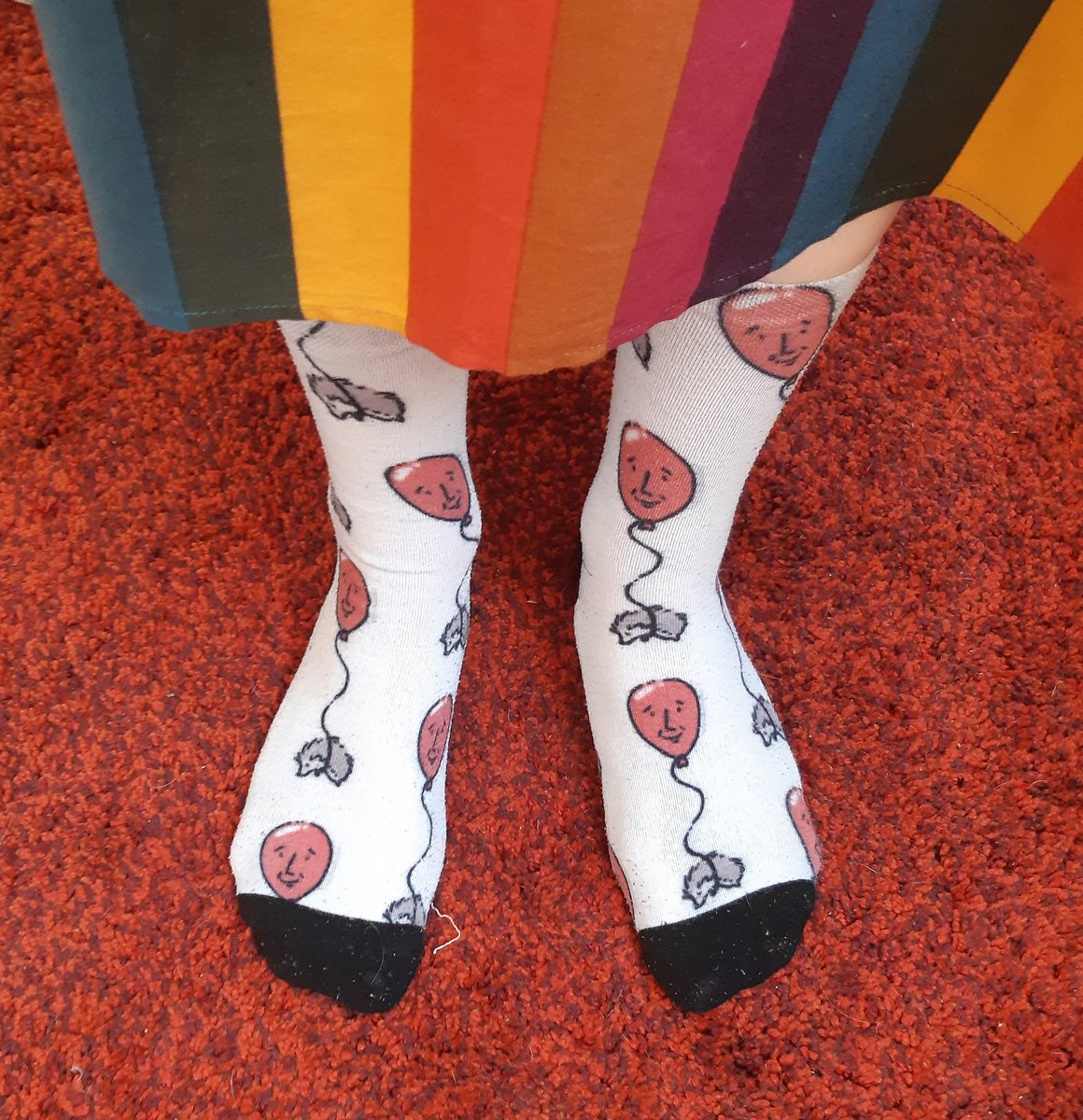 Sprinkledoodler's tweet photo. Going to Pride today! So obviously I'm wearing my Sherlock socks. (and rainbow dress) https://t.co/1381QdMn15