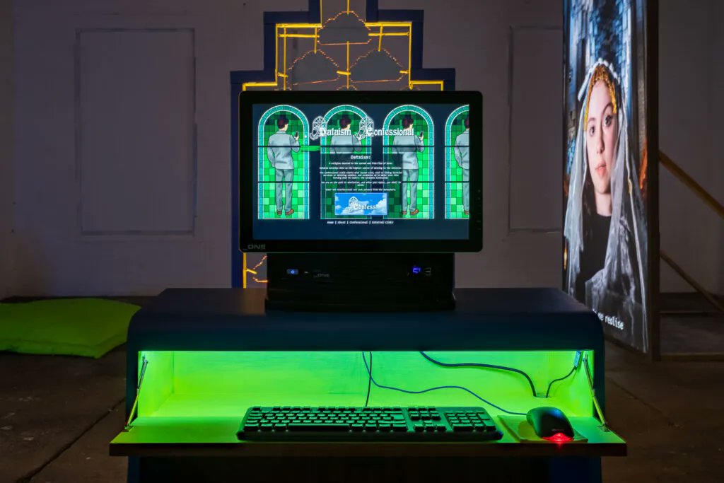 Corridor8's tweet photo. ‘Those wishing to confess must kneel before a computer screen and keyboard, submitting their sins via an online form.’

@ZaraWorth reflects on @RonnieDanaher_ iConfess at @Assembly_Leeds 
https://t.co/oX2AthKD4i https://t.co/MbW8H0o6TZ