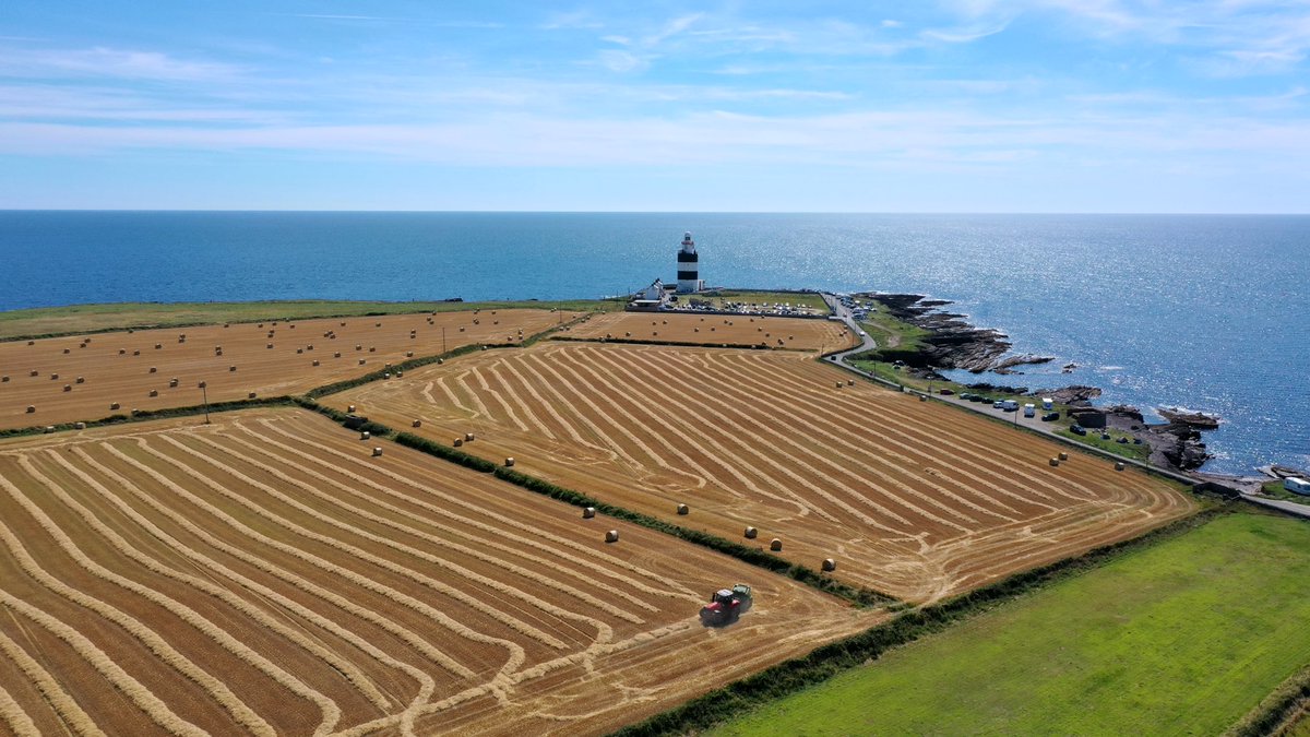 CarlowWeather's tweet photo. Dry weather means farmers are busy harvesting at present so take care on roads in rural areas. I just took these photos near Hook Lighthouse in Wexford. A fine spot looking even better on a great day. https://t.co/DU0lfDhaKT
