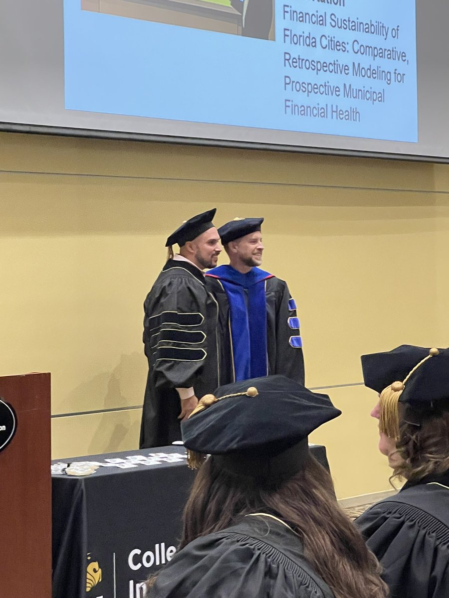 DrDougG's tweet photo. Congratulations to Dr Terry Henley for graduating with a PhD in Public Affairs. Also, congrats to @DaveMitchellUCF he his excellence work as dissertation chair. #GoKnights #BuiltForService @spaucf @UCFCCIE https://t.co/IEltPu180g