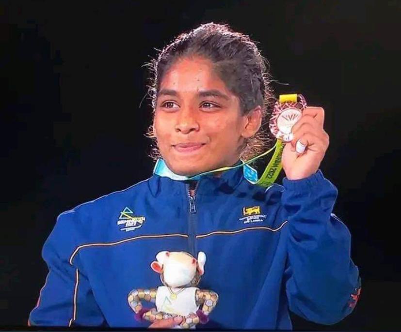 Rosh_Maha's tweet photo. Congratulations to Nethmi Poruthotage for winning the Bronze medal 🥉 in Wrestling at the Commonwealth Games. 
An incredible achievement especially being a teenager and hope this inspires future generations to come! 
#commonwealthgames2022 #srilanka #lka https://t.co/jIRgwNKquo