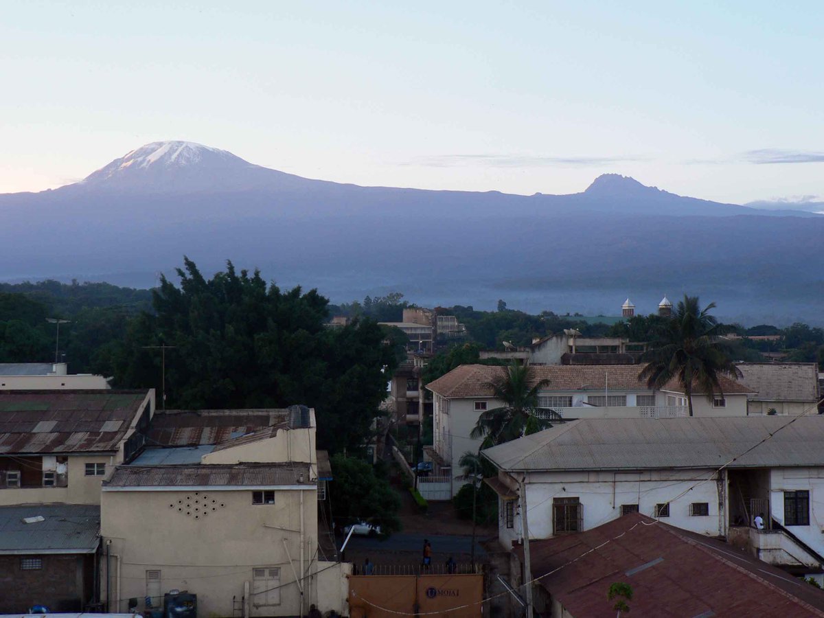 SENE_TZ's tweet photo. Moshi Town! Home of the SENE office and city at the base of Kilimanjaro. The streets of Moshi are always bustling, and the markets are full of life! Take a walking tour of the city to see some of the excitement and history! #MoshiTZ #SENE https://t.co/Pgw4Hrv9wT