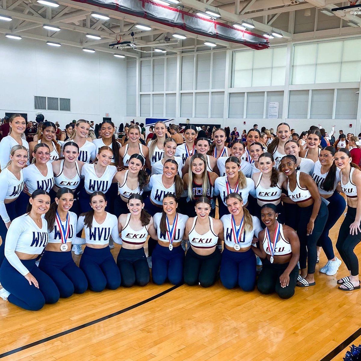 WVUDANCE's tweet photo. Your NDA Camp Best All Around Team is bringing home the gold to Morgantown!🥇 
- 1st in Game Day 
- Best-All Around Team
- Most Spirited
- Most Collegiate
- 2nd in Team Performance 
- GOLD bid to nationals🏆
- 5 All-Americans
- Top Gun Leaps
- Top Gun Turns
- 4 NDA Staff Invites https://t.co/P2K6ueIKL2