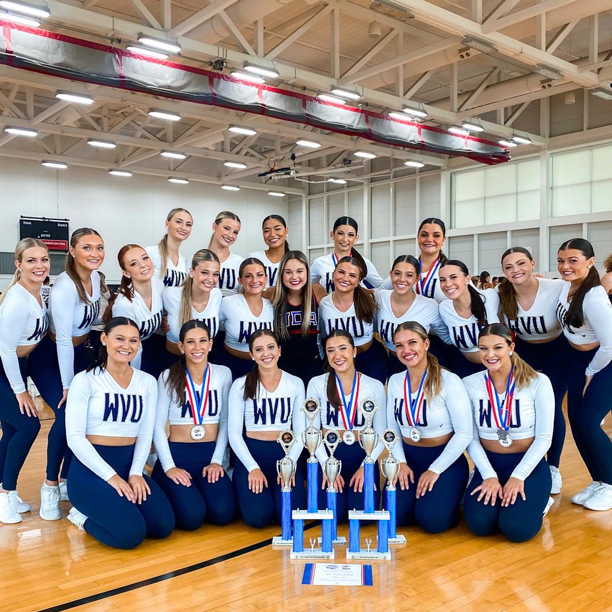 WVUDANCE's tweet photo. Your NDA Camp Best All Around Team is bringing home the gold to Morgantown!🥇 
- 1st in Game Day 
- Best-All Around Team
- Most Spirited
- Most Collegiate
- 2nd in Team Performance 
- GOLD bid to nationals🏆
- 5 All-Americans
- Top Gun Leaps
- Top Gun Turns
- 4 NDA Staff Invites https://t.co/P2K6ueIKL2