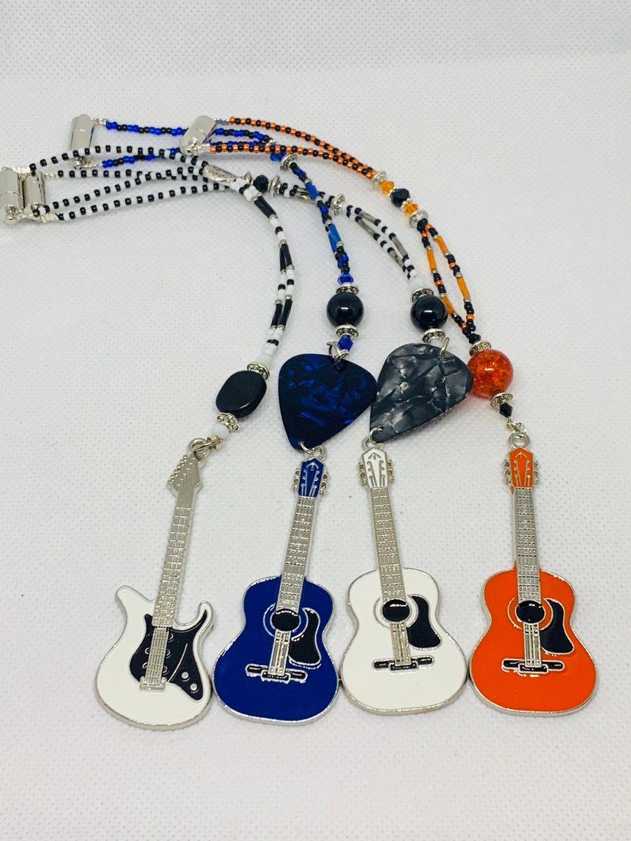 Steffrzz's tweet image. Excited to share the latest addition to my #etsy shop: GUITAR Pick with Guitar or Electric Guitar (CUSTOMIZE Colors) Car Accessories Rear View Mirror Car Charm etsy.me/3P6E6HX #guitarcharm #carcharm #caraccessories #caraccessory #carcharms #mirrorcharm