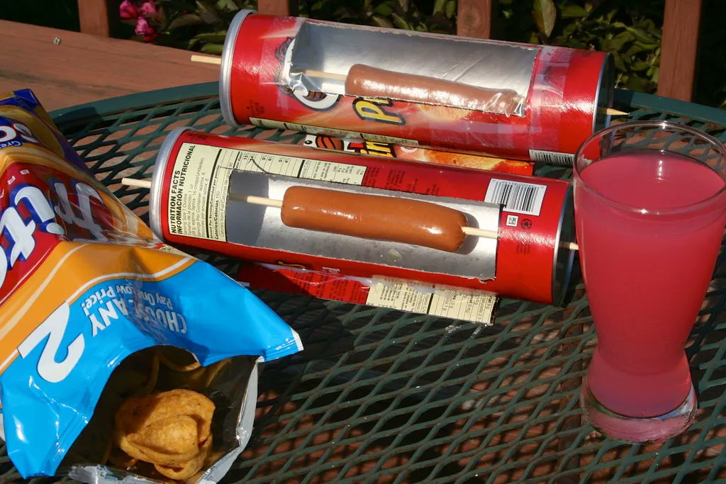 Solar ovens can come in all shapes, sizes, and with built-in snacks! 

https://makezine.com/2014/06/08/how-to-solar-hot-dog-cooker-from-a-pringles-can/ 