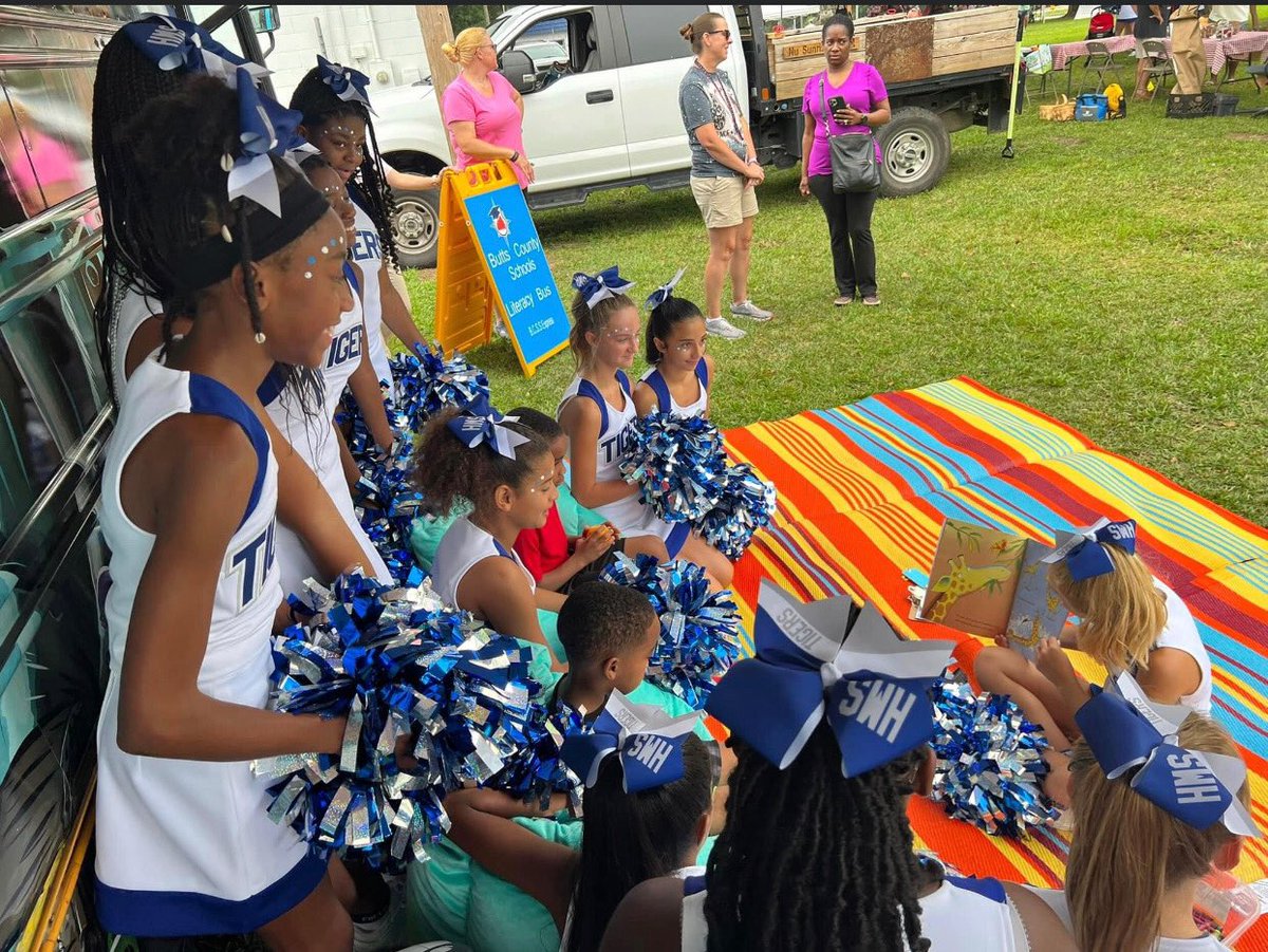 ButtsCoSchools's tweet photo. Henderson Middle School Cheerleaders performed at Market Day this morning. These cheerleaders spent their Saturday morning reading to youth and showcasing the BCSS Literacy Express Bus. #BCSS #JoinUsInJackson #TigerAmbush https://t.co/NK1hdVKO3N