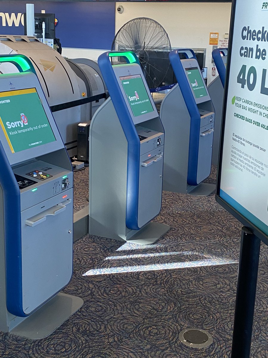 lcellam's tweet photo. The #Frontier debacle continues.  Apparently, the kiosks have never worked.  And there are only TWO agents (who are calm, miraculously). #notsorry https://t.co/SSAs2oUla9