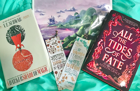 frozenbookblog's tweet photo. #giftmasinjuly Thank you @sageshelves! I made a weird noise when I saw the Peter Pan art I can't believe someone got it for me! It's so beautiful! The bookmarks are so cool and I'm excited to have these books! The chocolate bar isn't pictured cuz I already started eating it. XD https://t.co/2djN7ylkQ0