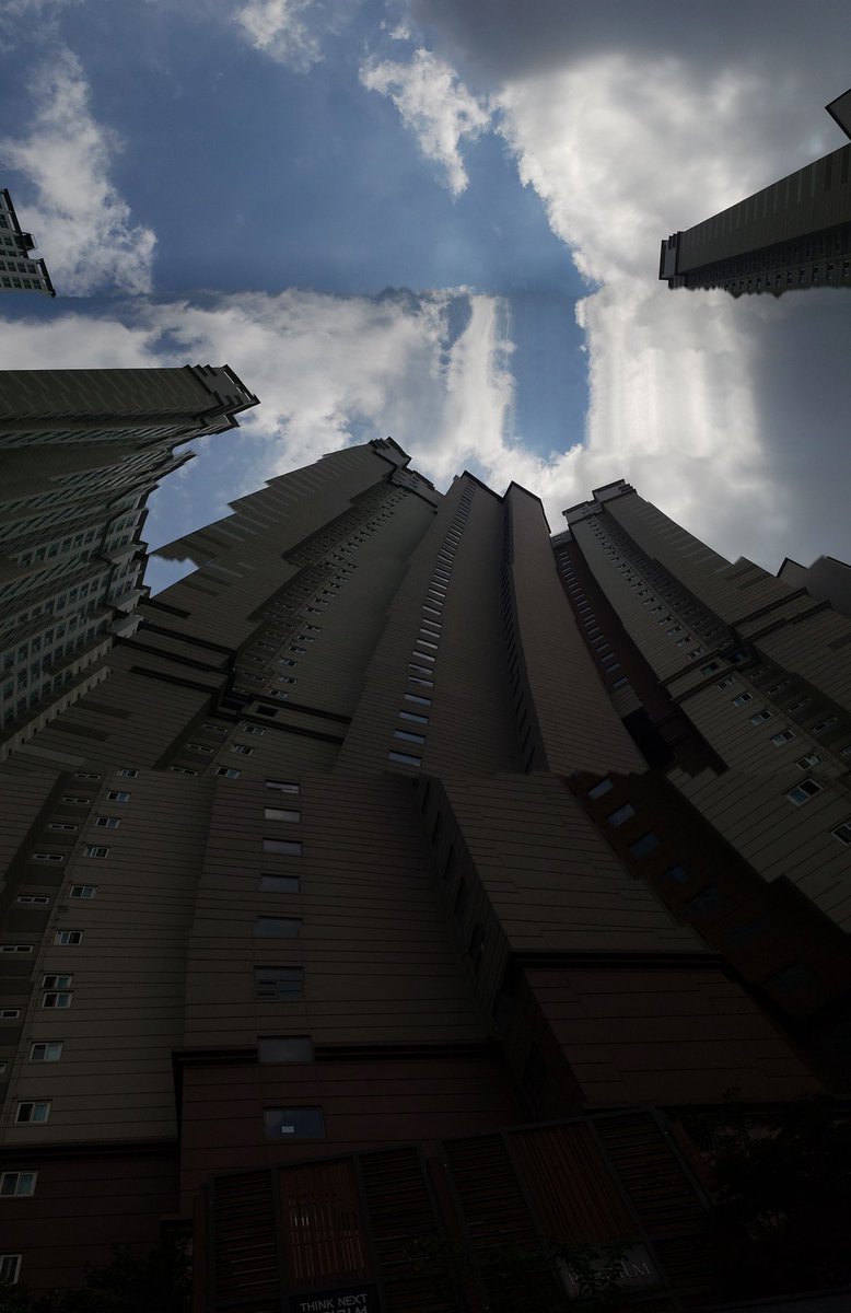 Phone panorama struggling hard with these tall buildings. 😆 #meme #joke