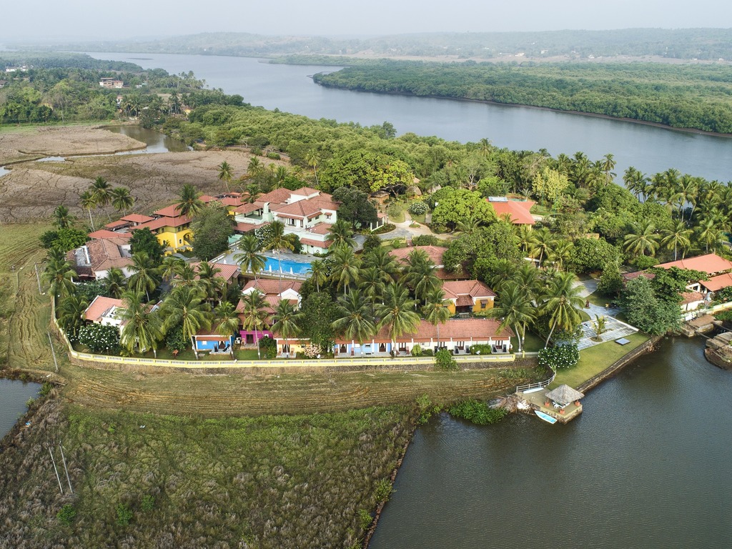 distantfrontier's tweet photo. Accessible only by a ferry, #Devaaya sits on the banks of the #MandoviRiver away from the frenzy that #Goa is associated with.  Reminiscent of the #Portugueseera, the retreat brings under one roof #Ayurveda, #Naturopathy and #Yoga to create the perfect balance your body needs. https://t.co/1SkrJbmbw6