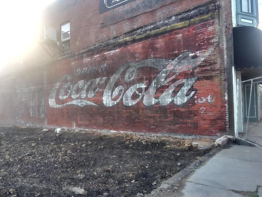 Mildly Interesting on Twitter "100 yr old Coca Cola painting unearthed when they torn down the