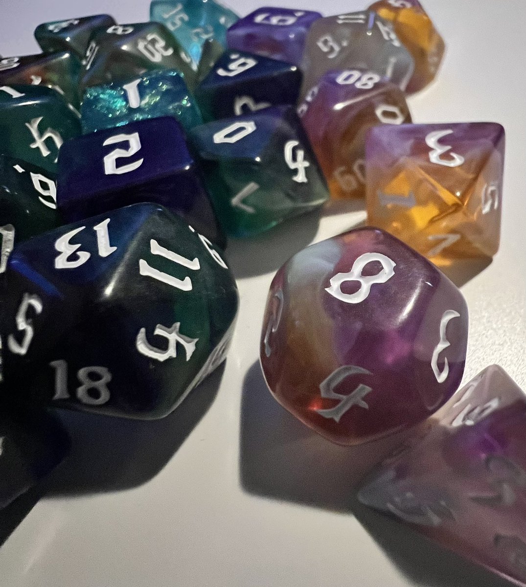 JDogTheJester's tweet photo. New sets from @TabletopLoot just came in! Very very very pretty this time around. Pictures don’t do them justice. I especially like the golden/white/purple set. #LootTroupe https://t.co/VXirwm5OYG