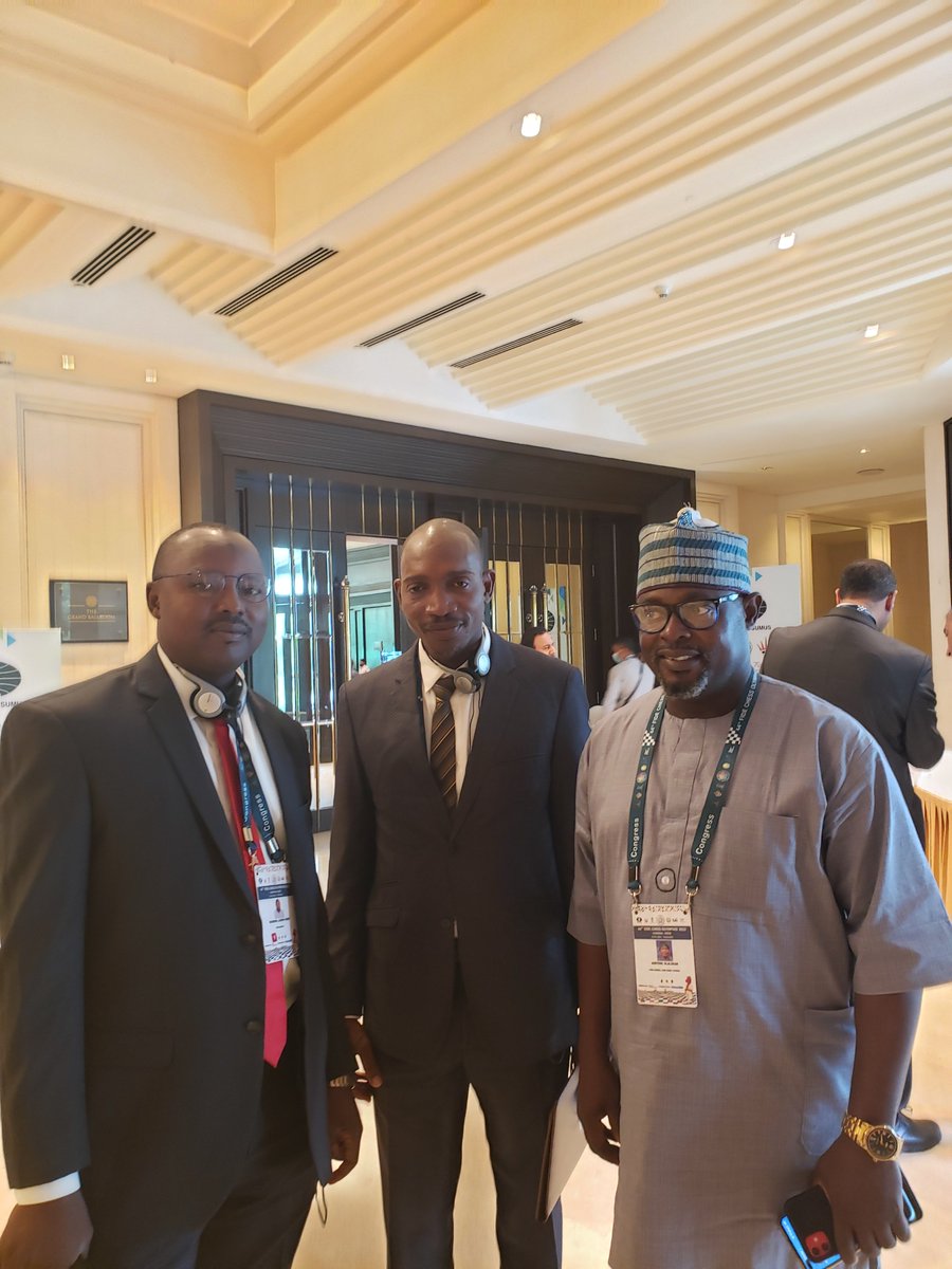 AnneMuyiwa's tweet photo. Many side events are going on especially in the #SayChess and #Uzbekistan booth. In a show of camaraderie, the Palestine team presented the new President of African Chess Confederation, Tshepito Lopang, with a sash... Other delegates from Africa discuss. @FIDE_chess @adeyemilekan https://t.co/CDAXuWAAI5