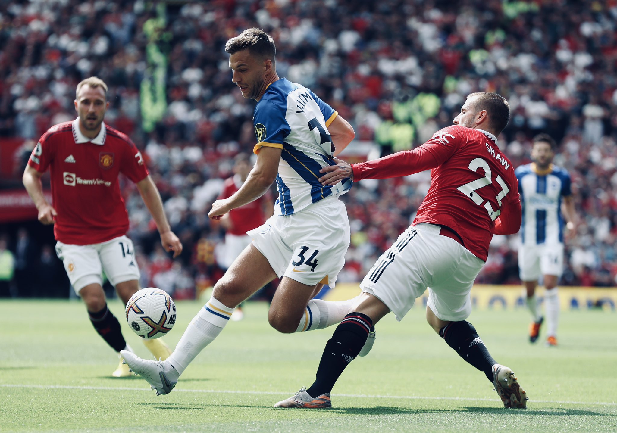 Luke Shaw attempts to challenge Joel Veltman.