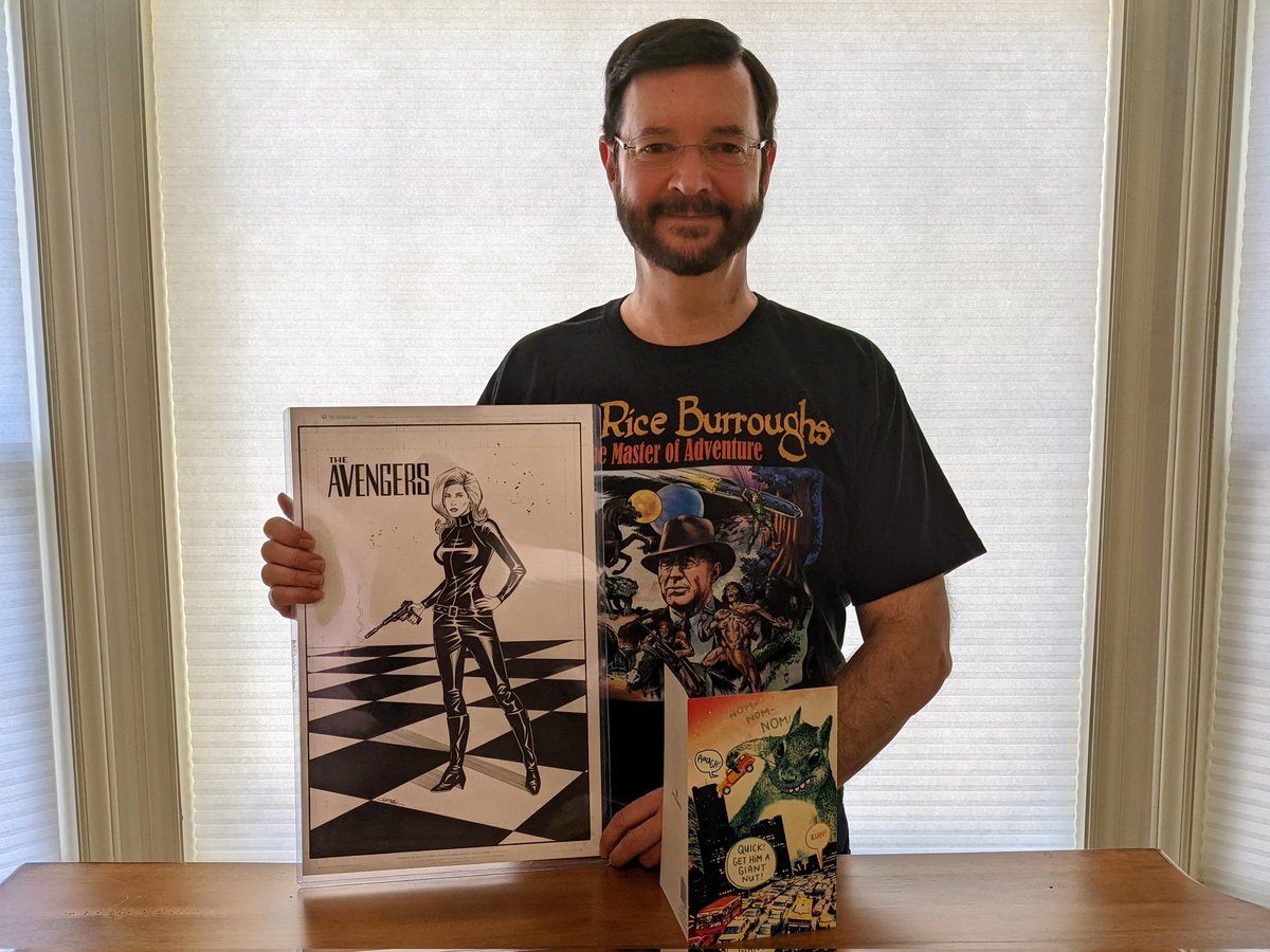 RaD_Adventures's tweet photo. Terrific birthday gifts from my dear friend Brian @bri_reno including a collection of #Tarzan comic strips, an #EdgarRiceBurroughs t-shirt, and a stunning commission of #EmmaPeel from #TheAvengers by #ChrisRing! Thanks Brian! https://t.co/F1W411TbFS