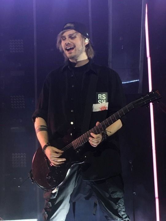 Michael in purple lighting