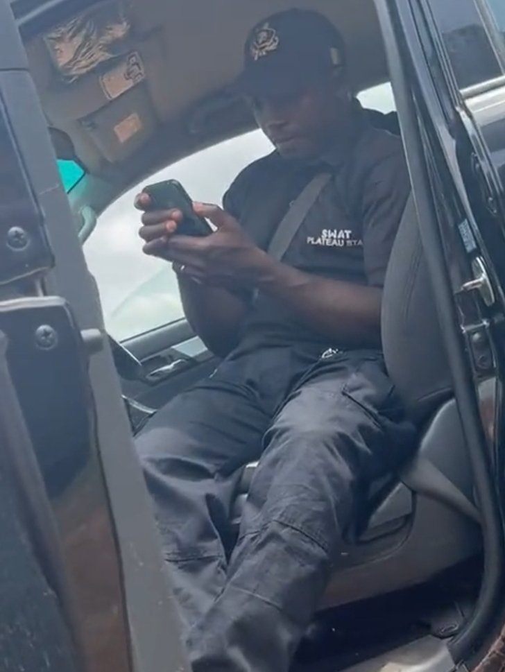 EdoDNA's tweet image. The face of a janjaweed terrorist in uniform searching someone's phone and looking for a reason to kidnap him. They've forgotten about #EndSARS