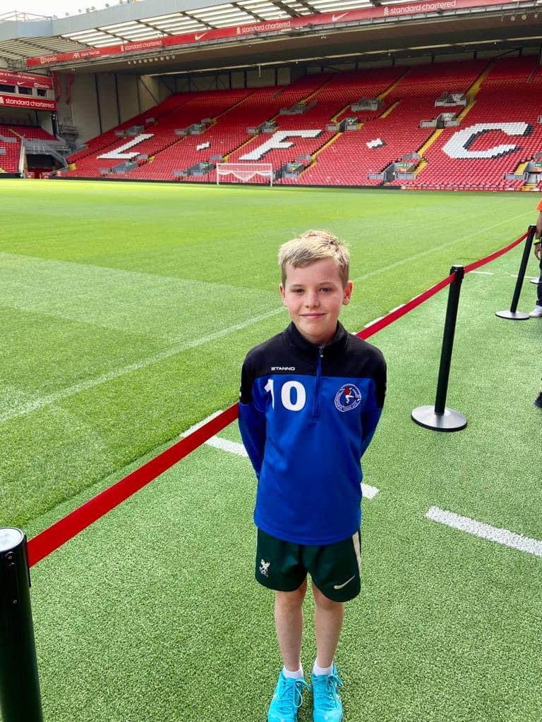 pstjfc's tweet photo. WHO WE ARE - It’s back again!!!

This “PST on Tour” entry sees U13s Harry representing the club whilst on a Anfield Tour!

Full marks for wearing PST club attire whilst out and about Harry!!! 👏🏻👏🏻👏🏻

Where will PST be represented next?? 🤔🤔🤔

#PSTonTour #WhatAClub #PST 💛⚽️💙 https://t.co/x5PRf1g8XA