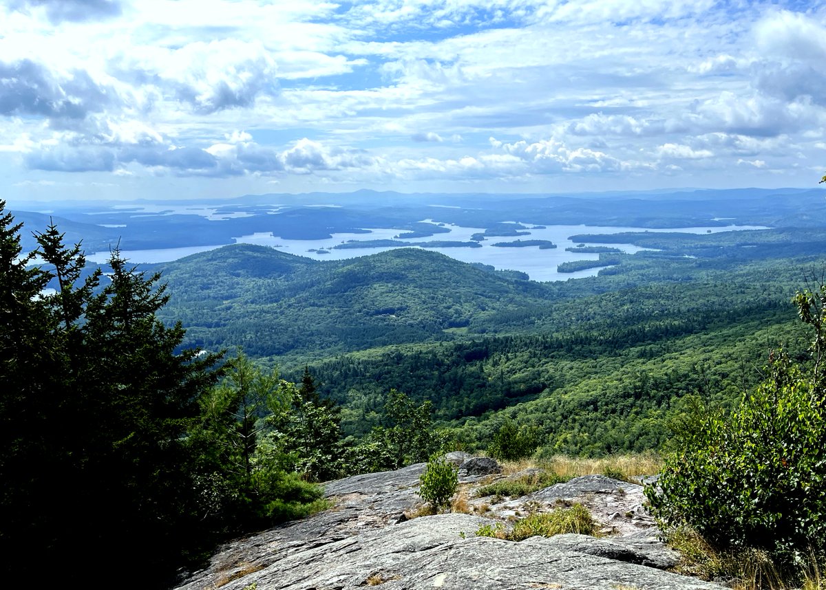 thorntontd's tweet photo. Escaped to the White Mountains of NH for a pleasant Sunday hike in gazillion-percent humidity. Where is that damn Snow Miser when you really need him? Views still stellar, no matter the season. This is from atop Mt. Percival w/ Squam Lake to the south. https://t.co/5O2SAdLjMD