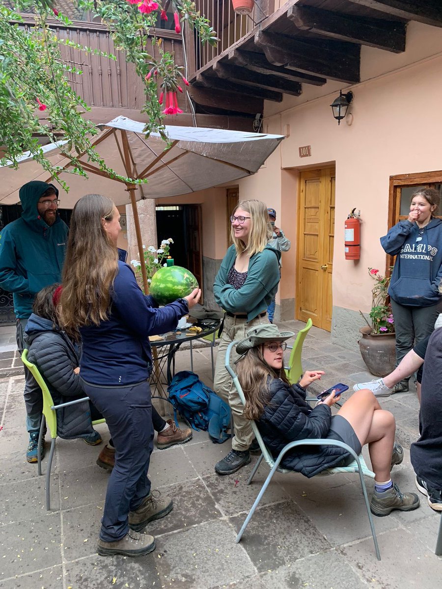 campperu's tweet photo. And if you don’t have a cake…a watermelon will do! 😄 🍉 Happy birthday! 🎁#TeamPuka celebrated a birthday before leaving to the airport for their flight to Lima #dosomethingamazing #campseffect @CampsInt https://t.co/EIccjJ0XCI