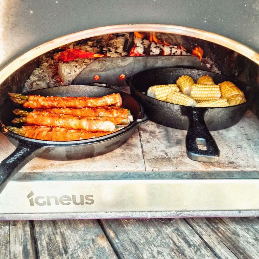Alfiekbbqs's tweet photo. Me and dad cooked this up.
Cooked in the @igneus_ovens with the Tuscan grill and cast iron set. 
2 huge steaks served with bacon wrapped asparagus dusted in @TheSmokeyCarter Carolina BBQ rub, corn with oak smoked garlic butter #bbq #ukbbq #igneus #woodfired #livefirecooking https://t.co/cbW0L40f2a