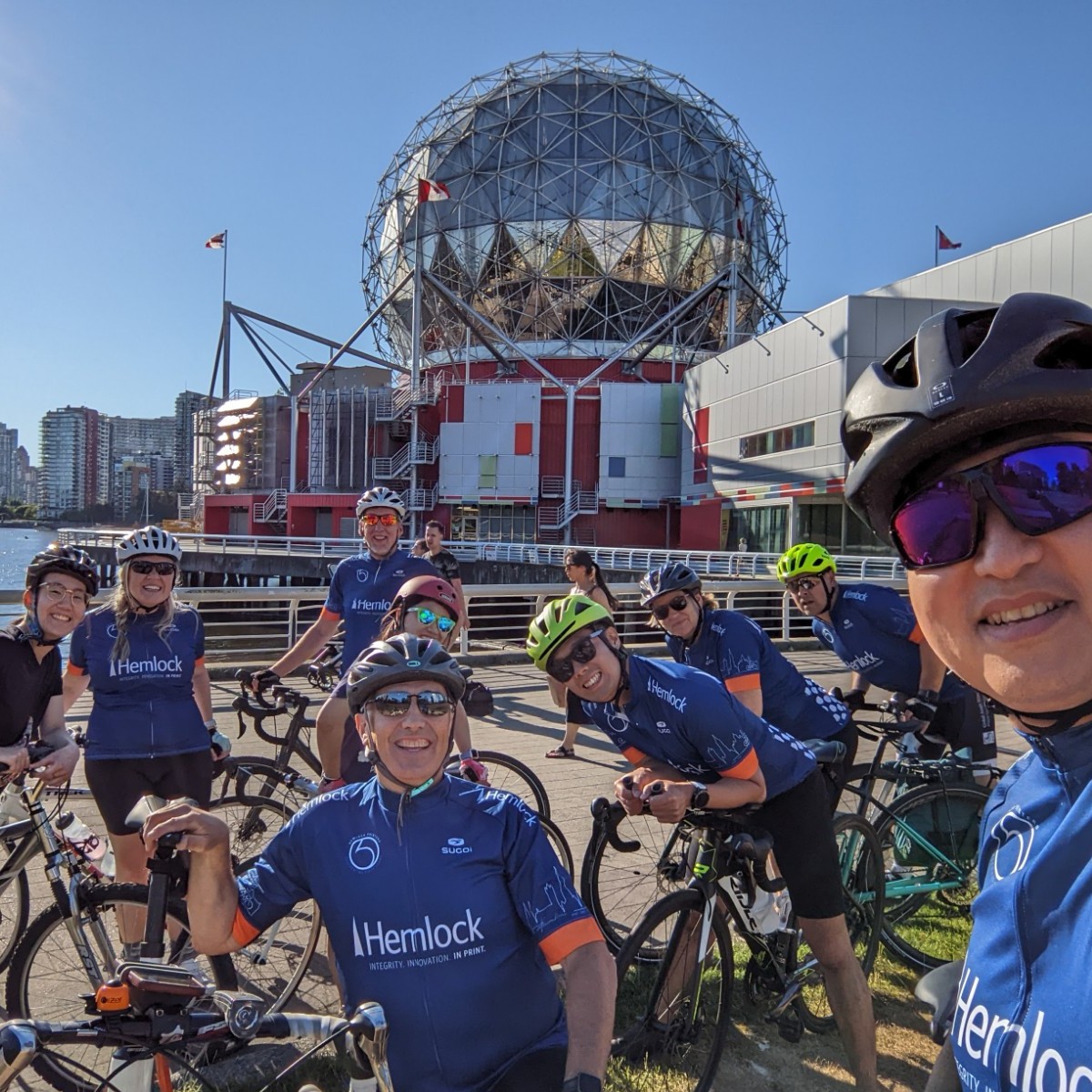 HemlockPrinters's tweet photo. Did you see our bike crew out for a ride last Thursday in their new jerseys? Our Social Club organized some community bike rides for our staff and last Thursday the team went #cycling from Hemlock's main office location in south Burnaby to Science World, and back again! https://t.co/Pddl9cp3MC