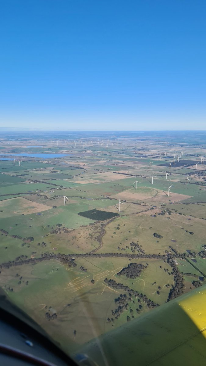 robinsaviation's tweet photo. I'm a bit of a greenie at heart, but I can't help think these windmills are environmental vandalism. I'm flying down to southern Victoria and had a rough count of approximately 1000 of these things, not one of them are spinning. Just can't see these as viable energy option? https://t.co/atCoPRtPJg