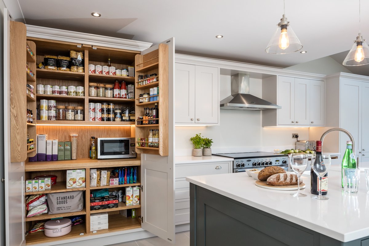A larder is not just a storage cupboard! This large larder layout provides an abundance of super space to make it a workspace as well as a storage space…the contrasting oak against the painted cabinetry makes it even more of a feature.