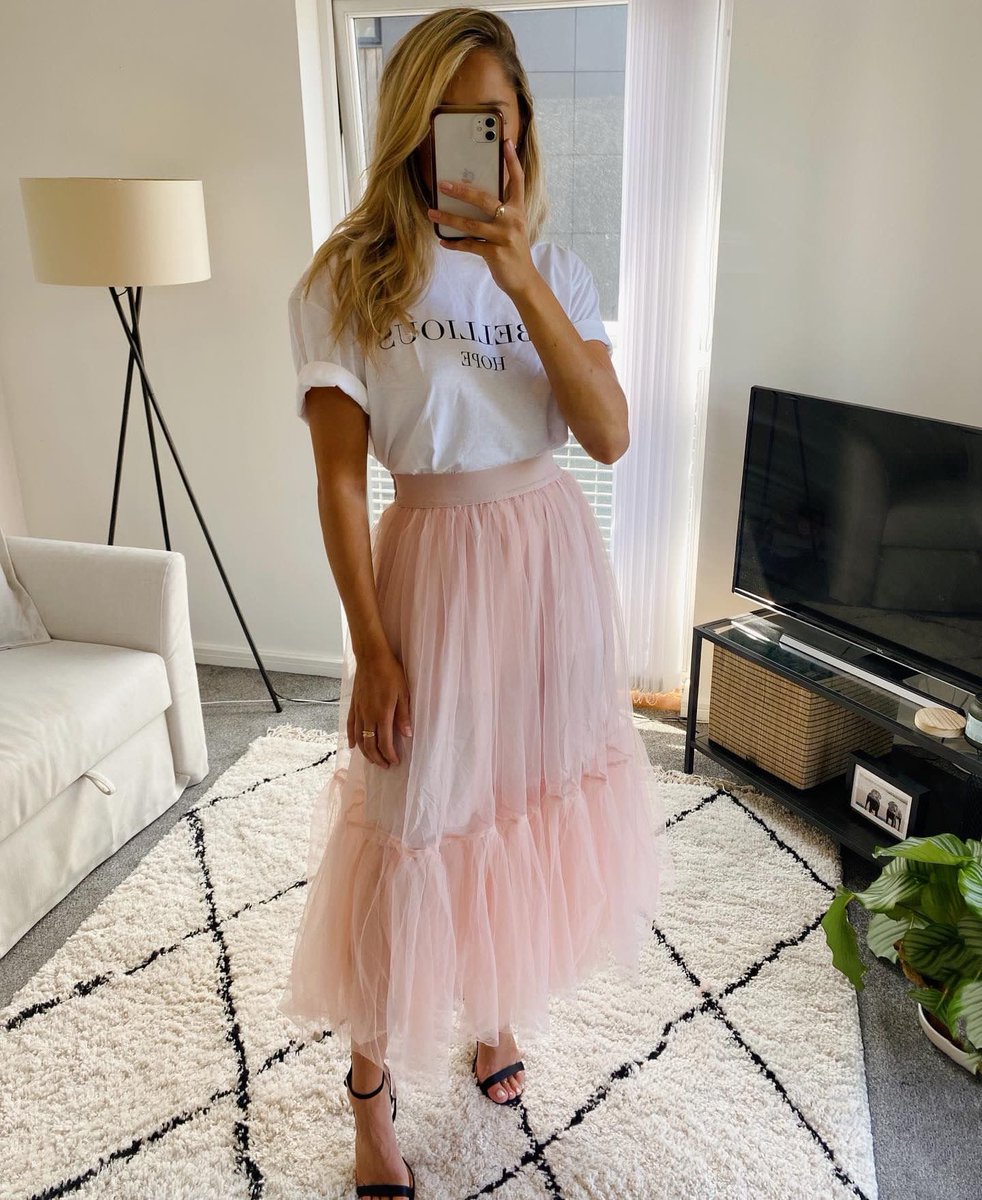 We love seeing you showing your support for our Dame Deborah James collection and 'Rebellious Hope' tees, with 100% of profits going to the @BowelbabeF for @CR_UK 💜 

Bella wears the white 'Rebellious Hope' tee and the 'Eloise Skirt', named after Deborah's beautiful daughter🤍