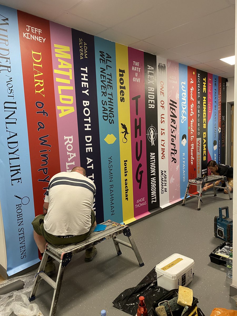 Our book wall is being installed!!!