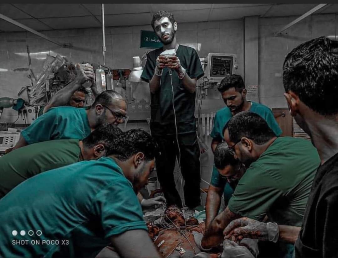 Belalmd12's tweet photo. Some heroes receive medals. Others go home with bloodstained shirts and aching backs. Salutes to our silent heroes, the doctors of #Gaza. https://t.co/VFLws9E8fN