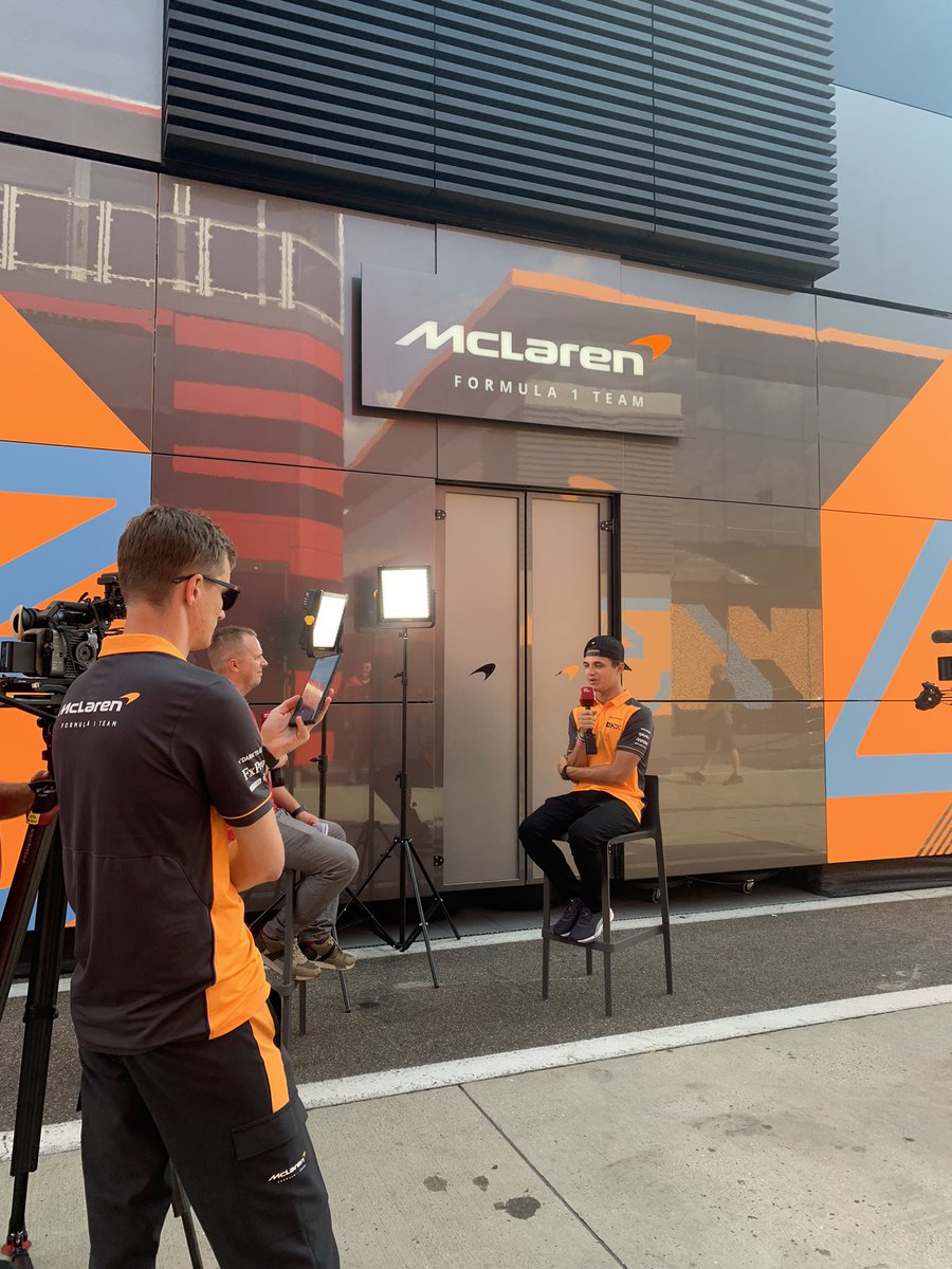 sevinalikesf1's tweet photo. THURSDAY: @LandoNorris getting interviewed, view of the fans on their pitlane walk from the @McLarenF1 garage, colourful decorations out by the @alfaromeoorlen hospitality motorhome, and the stunning @williamsf1 hospitality motorhome. https://t.co/9B3dv3SoDR