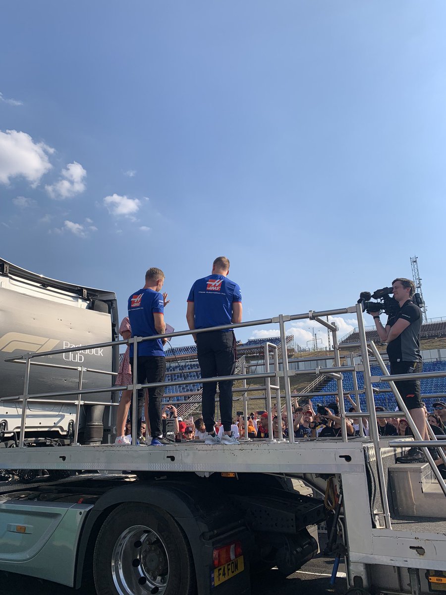 sevinalikesf1's tweet photo. THURSDAY: Team track interviews. Seb Vettel perched precariously on the side of the railings as he’s interviewed hours after his retirement announcement. @LewisHamilton looking incredibly fly and @GeorgeRussell63 with the sick skinny jeans. Mick and Kevin in full uniform. https://t.co/94rrtWUddZ