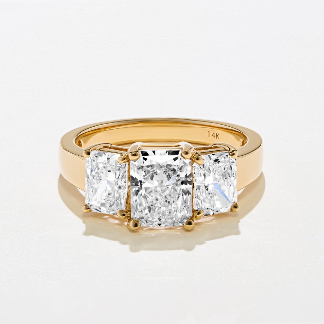 Triple the shine is worth every dime. We're obsessed with the glamor of three stone rings!⁠ 
⁠
Shop all Three Stone Rings, bit.ly/2Z4OyYq
Featuring: Reflection Three Stone Engagement Ring⁠