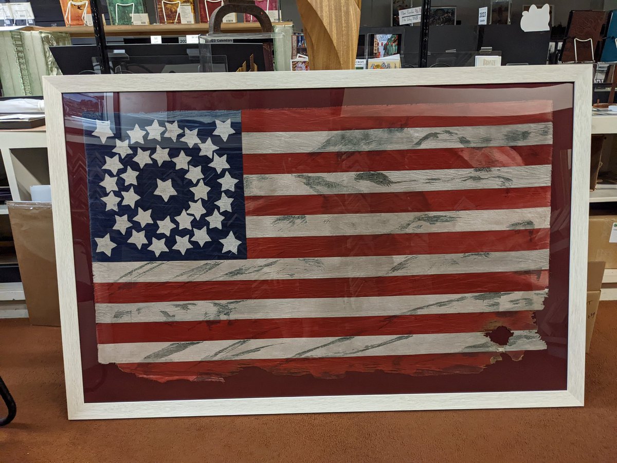 customer was told it's a real flag with a bullet hole. I think it was manufactured to decorate a hotel or maybe a steak house