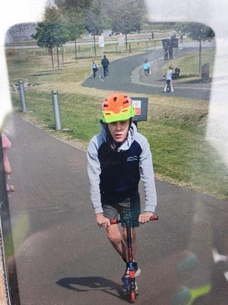 MISSING: 11 year old Liam Little was last seen at Helix Park in Falkirk about 2pm today when he became separated from his family. Liam is wearing the orange/yellow helmet and black hoodie pictured, and should still have his scooter with him. Please call 101 with any sightings: