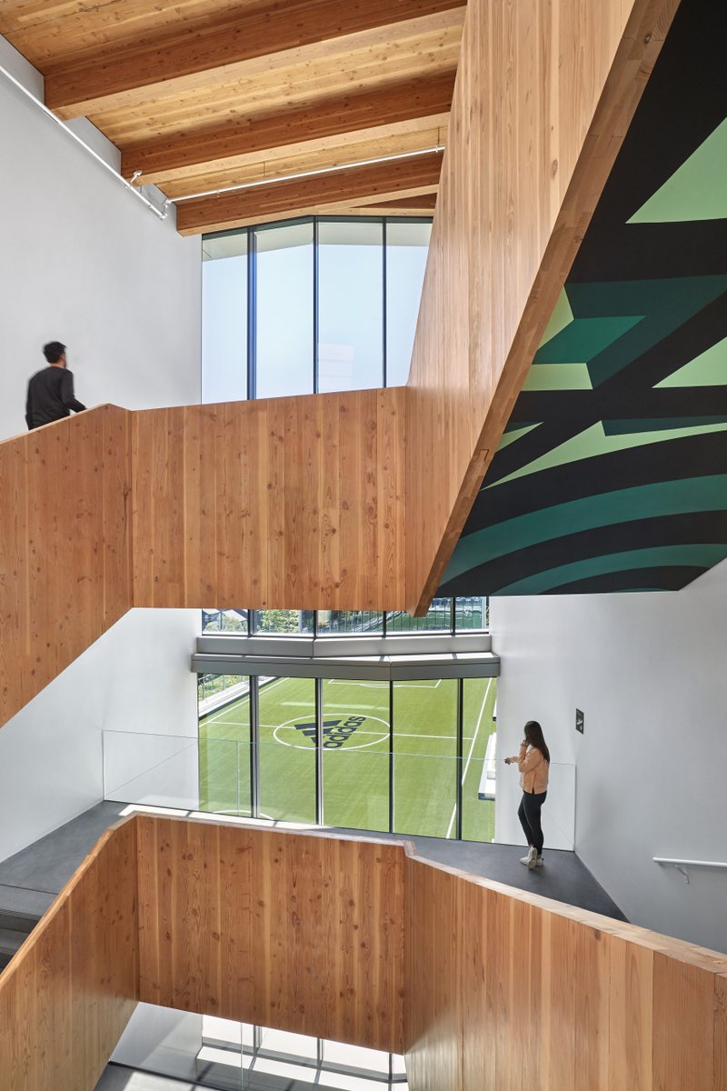 WoodDesignMag's tweet photo. The Adidas campus expansion is one of the largest #masstimber projects in the U.S. The addition of a new 182,000-sq.ft. office building and a 31,000-sq.ft. athletic center on campus showcases regional mass timber. https://t.co/lgMNXgqRj0 @LEVERARC #wood #design #architecture https://t.co/lfBo4Lvb9B
