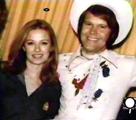 GlenCampbellFOG's tweet photo. Remembering @GlenCampbell the one and only #RhinestoneCowboy who left us on this date in 2017.
Pictured here in his definitive Rhinestone Cowboy outfit with then girlfriend #SarahDavis, later wife #SarahCampbell in late #1975 https://t.co/WCMh7IGhTI
