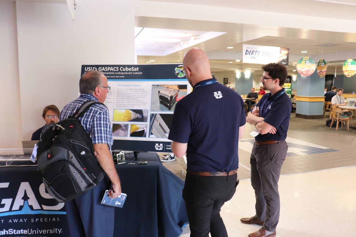 The USU #GetAwaySpecial Student Team is front &amp; center at #SmallSat Booth #14 in the Taggart Student Center 1st Floor near The Hub eatery. <a href="/GASPACS_CubeSat/">USU GASPACS CubeSat Team</a> <a href="/SmallSat/">Small Satellite Conference</a> <a href="/research_usu/">USU Office of Research</a> <a href="/USUAggies/">Utah State University</a> <a href="/USU_UR/">USU Undergrad Research</a> <a href="/UtahStatesman/">The Utah Statesman</a> <a href="/utahpublicradio/">Utah Public Radio</a> <a href="/HJNews/">The Herald Journal</a> <a href="/CVDaily/">CacheValleyDaily</a> <a href="/sltrib/">The Salt Lake Tribune</a> <a href="/Deseret/">Deseret News</a>  #CubeSat