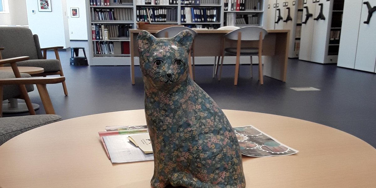 SciTechMuseum's tweet photo. It's #InternationalCatDay!🐈 Meet Milton, our purrfectly adorable cat and library mascot! When Milton isn't attending team meetings he likes to look at trade literature and rare books from the collection, oh and he loves his Fancy Feast...meow!  #LibraryCat #MuseumCat #CatDay https://t.co/9V0pLp5X9I