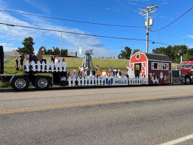 WellsConcrete's tweet photo. The Wells team outdid themselves this year when they made our fun float for the Albany Parade this Saturday! Farm animals, candy and beach balls - does summer get any better than that? #lifeatwells https://t.co/TWhnWu0CpX
