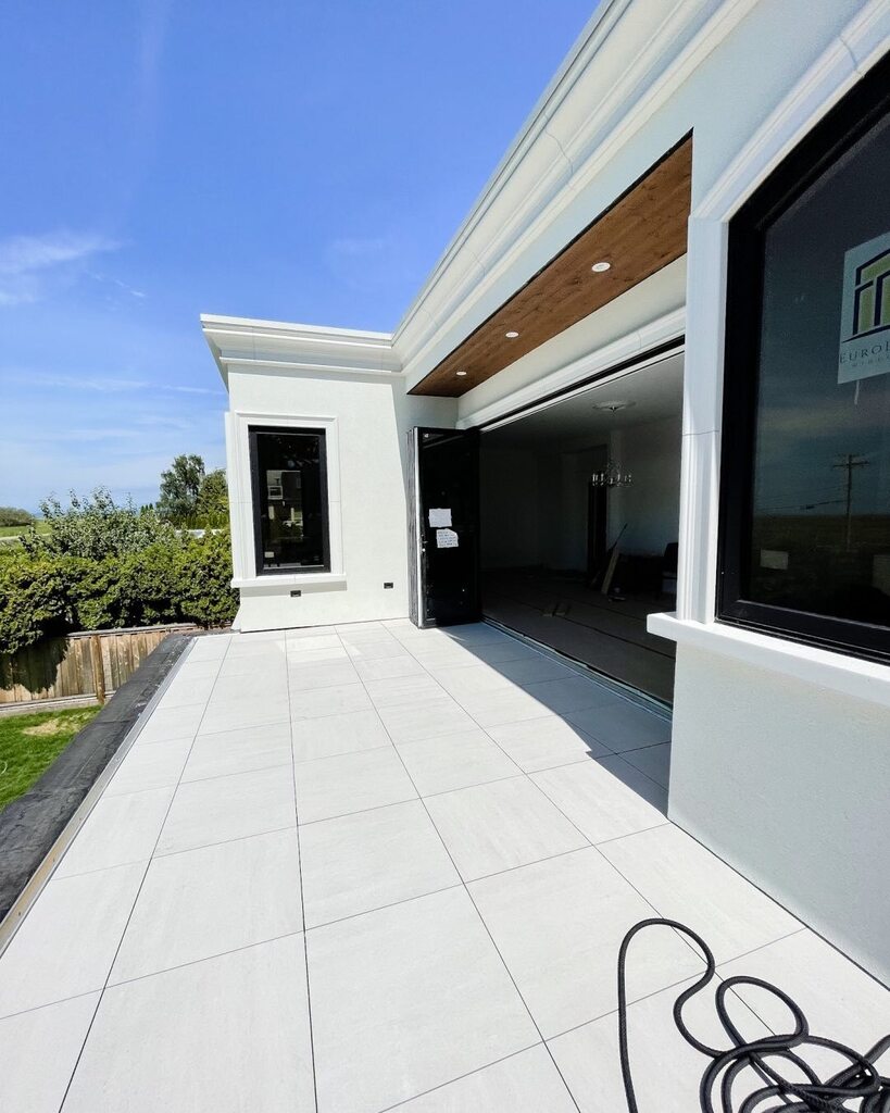 One of two patios overlooking the ocean… the owners wanted a French Estate style home and we worked extremely hard to ensure that theme worked with all aspects of design… weathered wood, crisp stonework and contemporary touches like a 14’ fold away g… instagr.am/p/ChAjNCYPnzs/