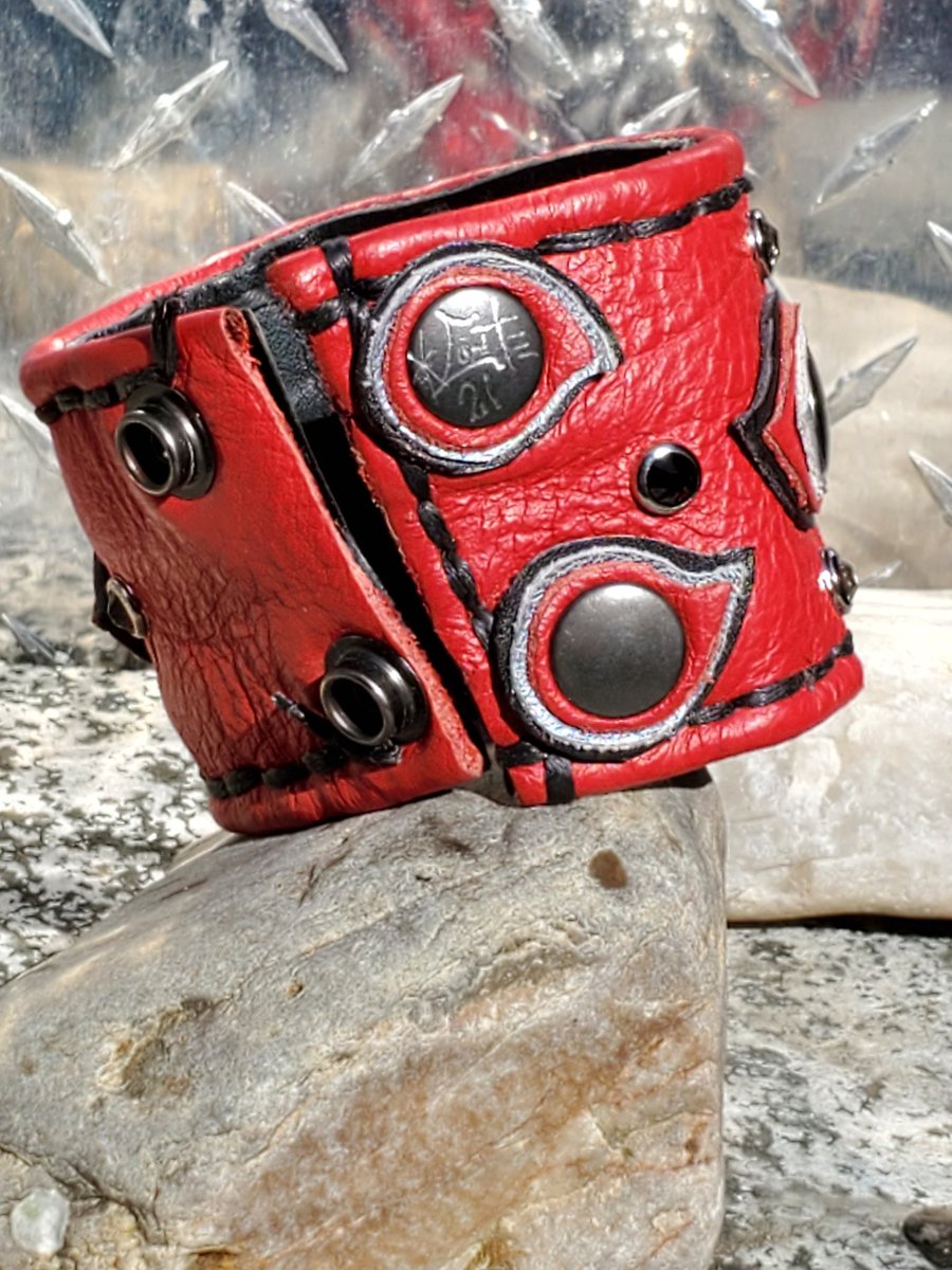 Check out these 2 Totally #oneofakind and unique #red #leathercuffs top quality centerpieces handstitched onto each cuff, genuine @swarovski rhinestones, handcut leather accents, #signed and #dated... #rockthecuff