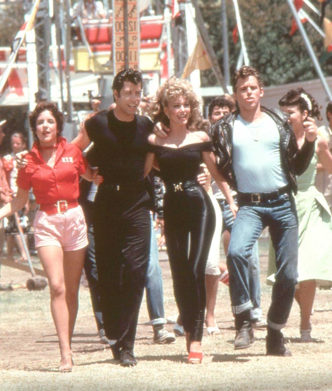 Dynamitedoll84's tweet photo. RIP to an absolute legend! #OliviaNewtonJohn You are the reason I wear high heels and leather pants! 👠❣️#Sandyforever #Grease https://t.co/e21PkuExKH